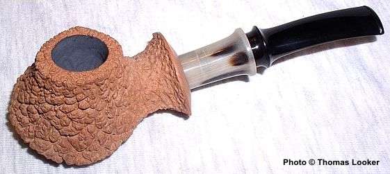 Rusticated volcano, with horn ferrule and unstained ("virgin") briar, 2003.  (Tokutomi-san rarely uses a fully-rusticated finish, which is a shame as his rustication has a wonderfully organic quality to it, due to his mastery of asymmetric design.)