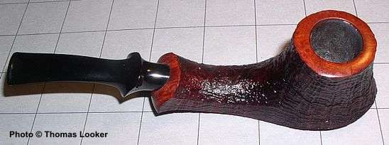 Partially sandblasted, long-shanked volcano, with spot-rustication (on bottom), 2003