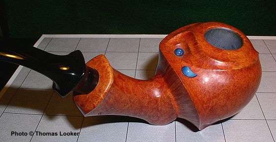 The blue inlays are indigo-stained ivory