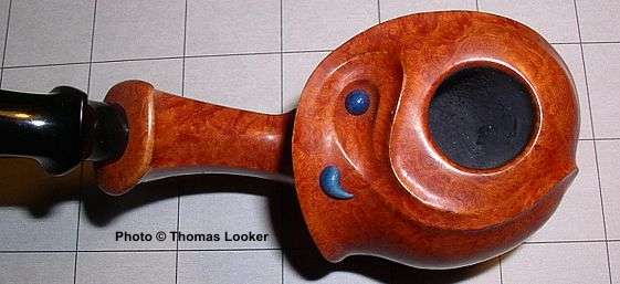 The blue inlays are indigo-stained ivory