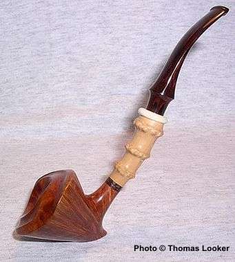 Freehand Dublin sitter, with faux-bamboo (carved boxwood) shank, Snail Grade, 2004.  First time Tokutomi-san has carved boxwood in this way.  A magnificent pipe.  Photo essay to come.