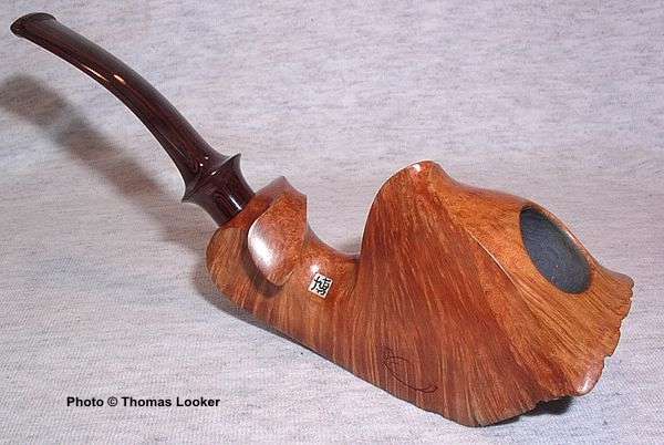 Freehand horn with rusticated bottom, Snail Grade, 2004.  The latest iteration of a sequence of uniquely shaped designs.  See SPC 089 and SPC 124.